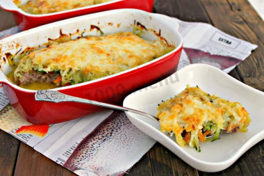 Zucchini with minced meat and potatoes in the oven