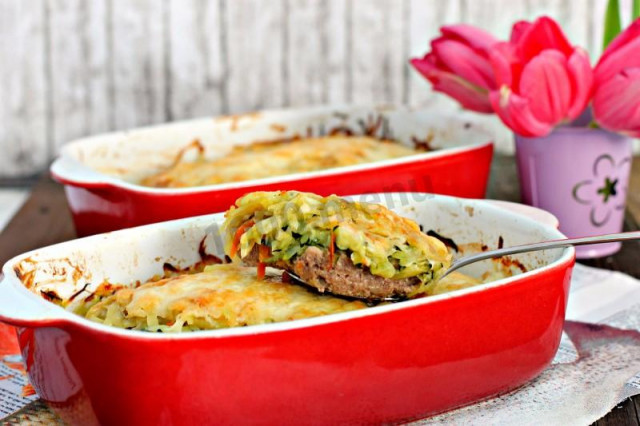 Zucchini with minced meat and potatoes in the oven