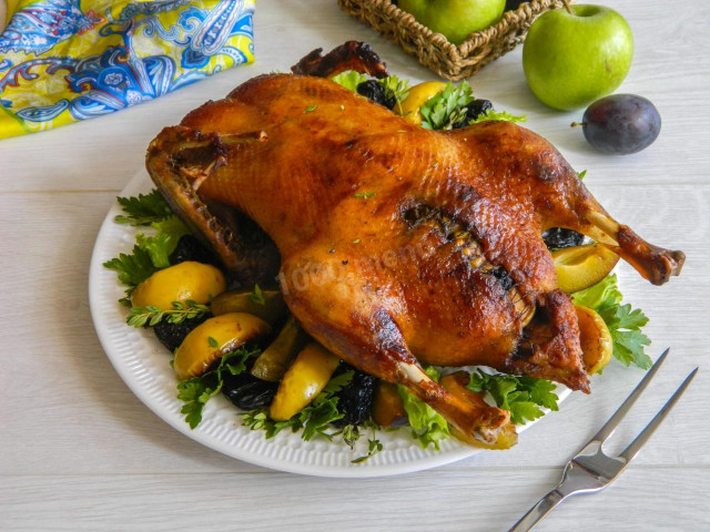 Duck with prunes in the oven