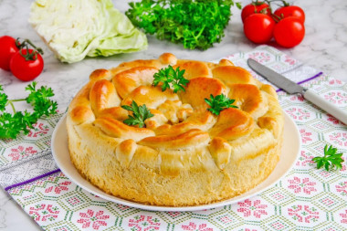 Yeast pie with fresh cabbage in the oven