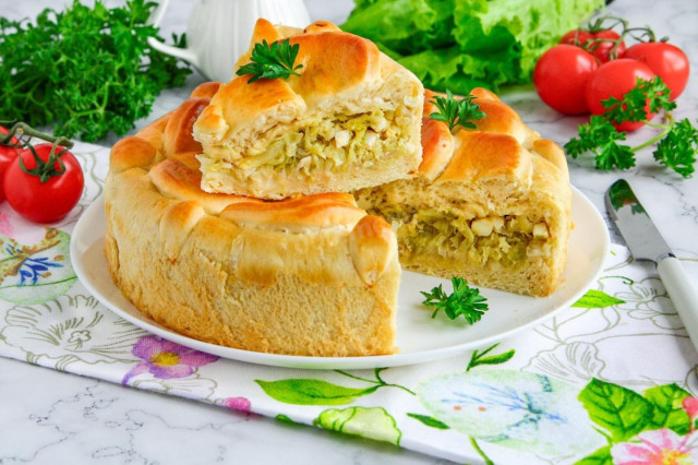 Yeast pie with fresh cabbage in the oven