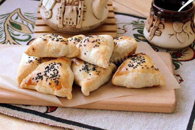 Puff samsa with meat in the oven