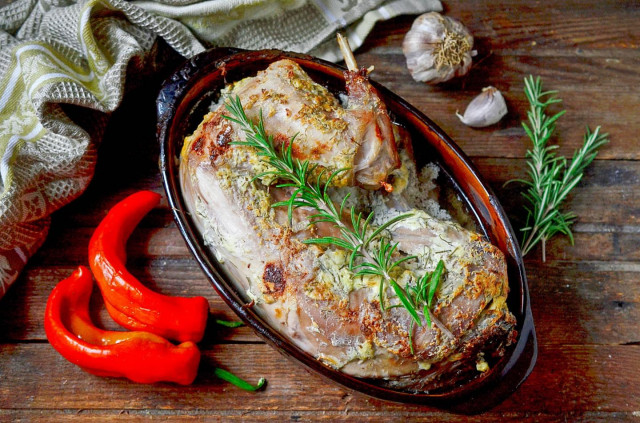 Whole baked rabbit in the oven