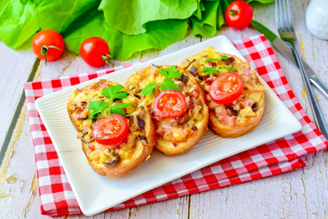 Hot sandwiches with mushrooms and cheese in the oven