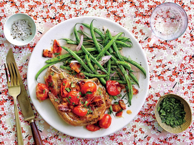 Pork chops in the oven with tomatoes