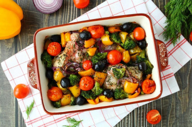 Sea bass baked in the oven with vegetables