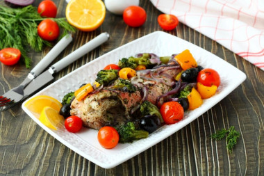 Sea bass baked in the oven with vegetables