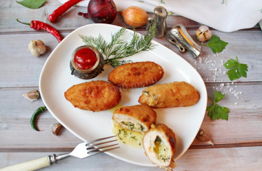 Kiev cutlets with cheese in the oven