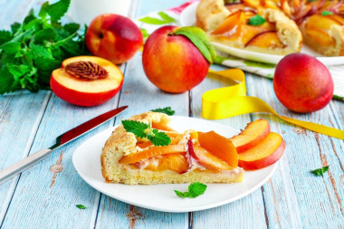 Shortbread pie with nectarines in the oven
