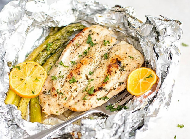 Portioned meat in foil in the oven