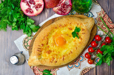 Adjarian khachapuri with suluguni cheese in oven