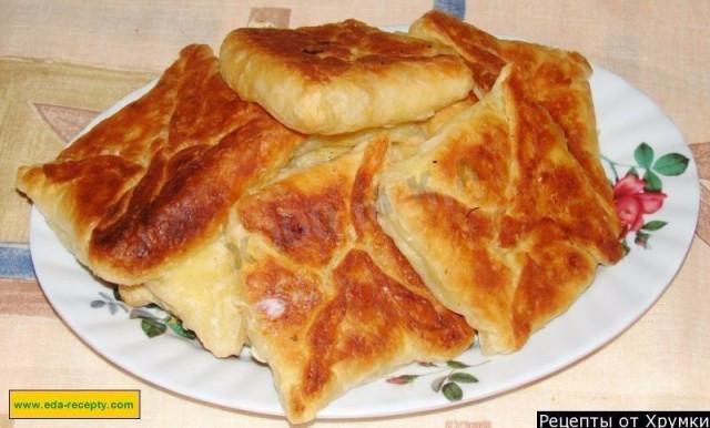 Khachapuri with cheese and potatoes in the oven