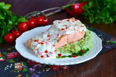 Pink salmon baked with cheese in the oven