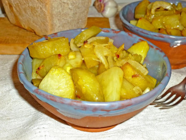 Baked potatoes with onions in the oven