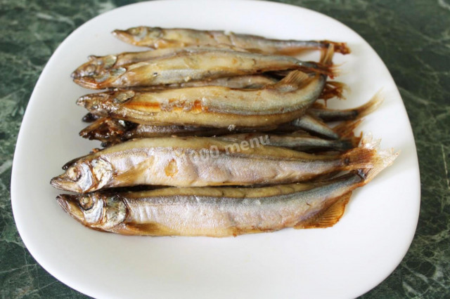 Capelin baked in the oven in oil