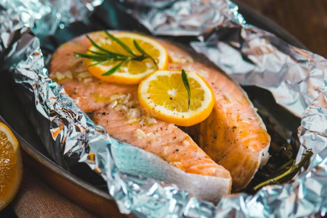 Pink salmon steaks in foil baked in the oven