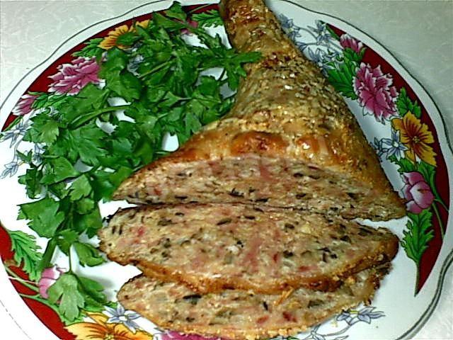 stuffed ham with mushrooms in the oven