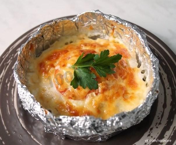 Chicken fillet in potatoes in foil baked in the oven