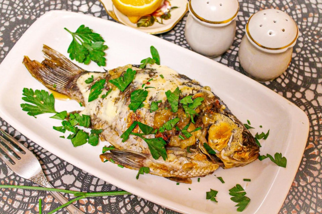 Baked crucian carp in kefir in the oven