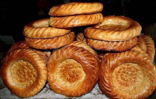 Delicious yeast Uzbek tortillas in the oven