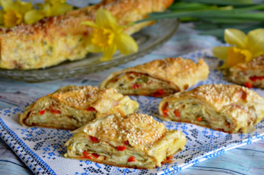 Lavash with cottage cheese and melted cheese in the oven