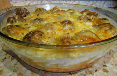 Baked pasta with meat meatballs in the oven