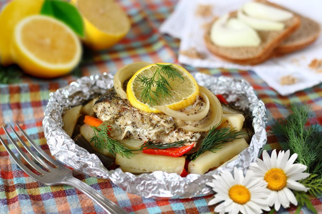 Catfish steak with potatoes in the oven