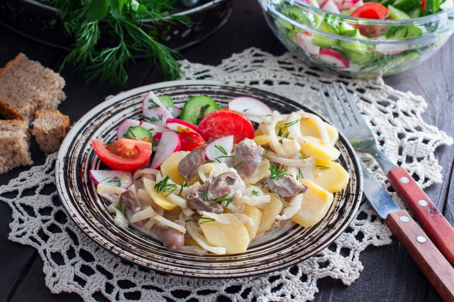 Chicken hearts in the oven with potatoes