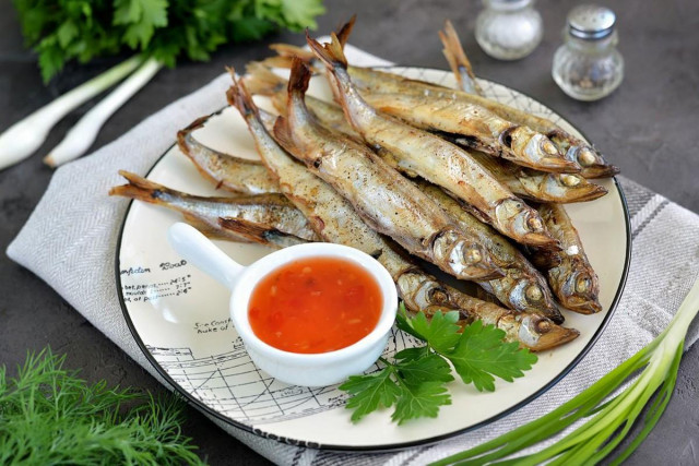 Capelin in the oven without oil