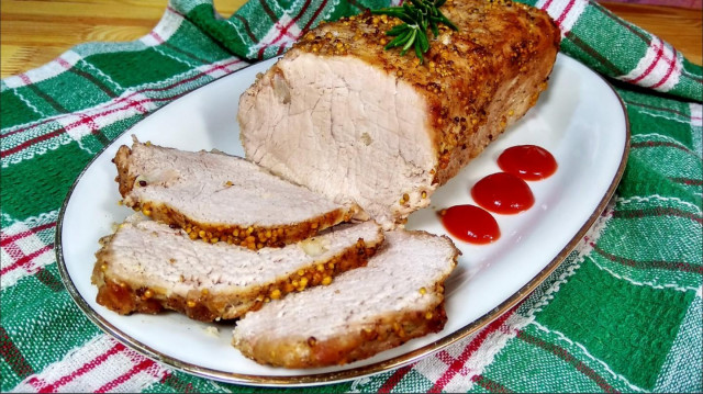 Pork meat baked in the oven with mustard and honey