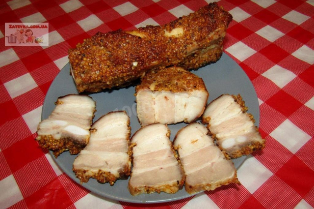 Pork belly in mustard marinade in the oven