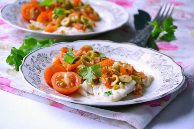 Cod fillet in the oven with tomatoes and olives