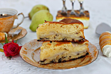 Pie with pears and chocolate in the oven in Italian