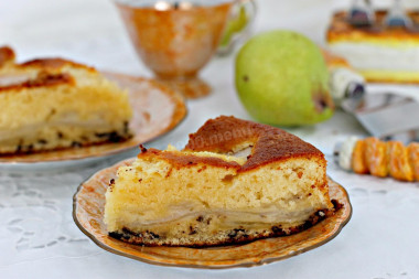 Pie with pears and chocolate in the oven in Italian