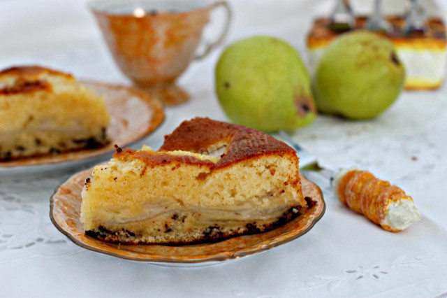 Pie with pears and chocolate in the oven in Italian