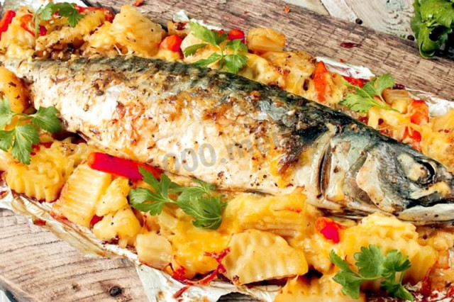 Mackerel with vegetables in the oven in foil baked