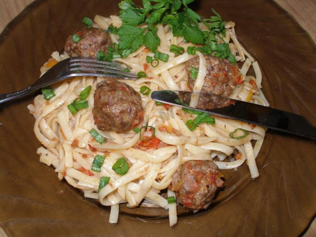 Pasta with meatballs in the oven