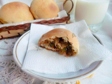 Yeast pies with cabbage and egg in the oven