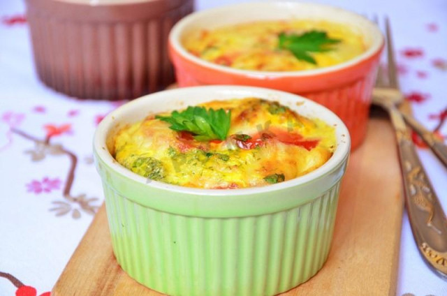 Fritata omelet with ham and cheese in the oven