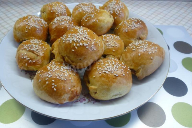 Baby buns with a filling of cabbage and mushrooms in the oven