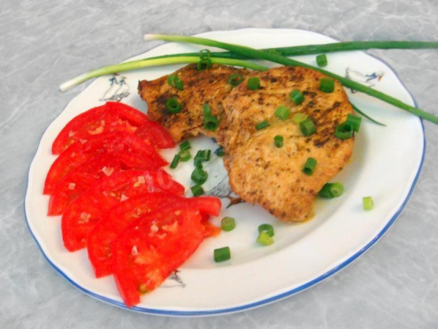 Chicken fillet with paprika in foil in the oven