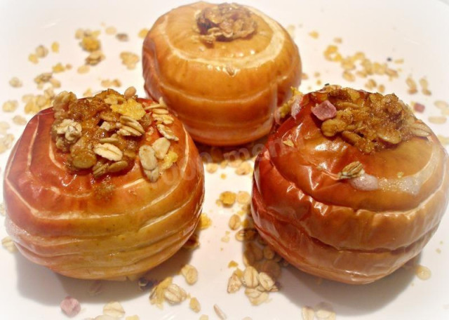 Baked apples in the oven with muesli dessert