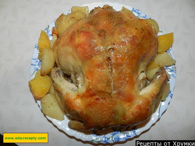 Chicken in a sleeve with potatoes in the oven