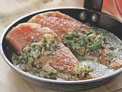 Flounder baked with vegetables in the oven