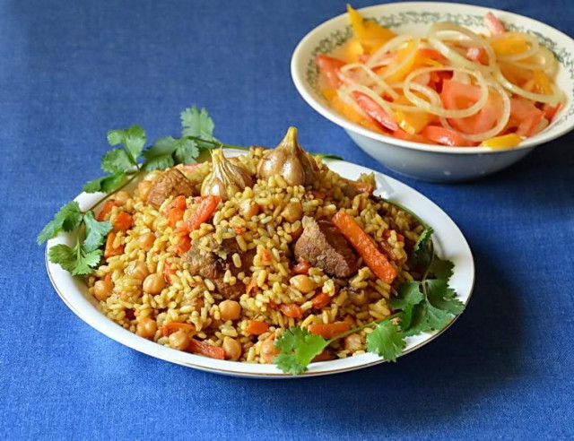 Pilaf with chickpeas in a cauldron