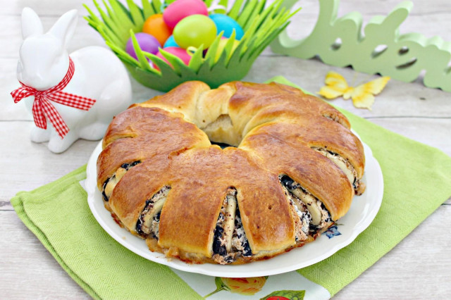 Easter roll with meringue, chocolate and nuts