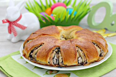 Easter roll with meringue, chocolate and nuts