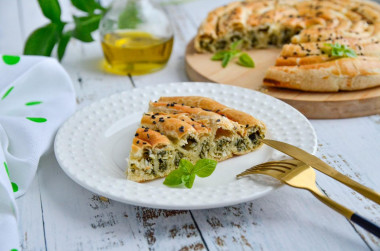 Greek snail with cheese and spinach from puff pastry