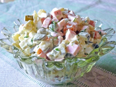 Olivier salad with pickles and sausage classic