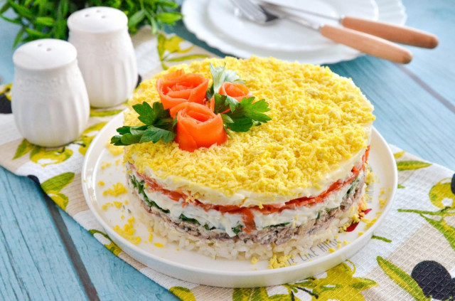 Mimosa salad with canned food and rice